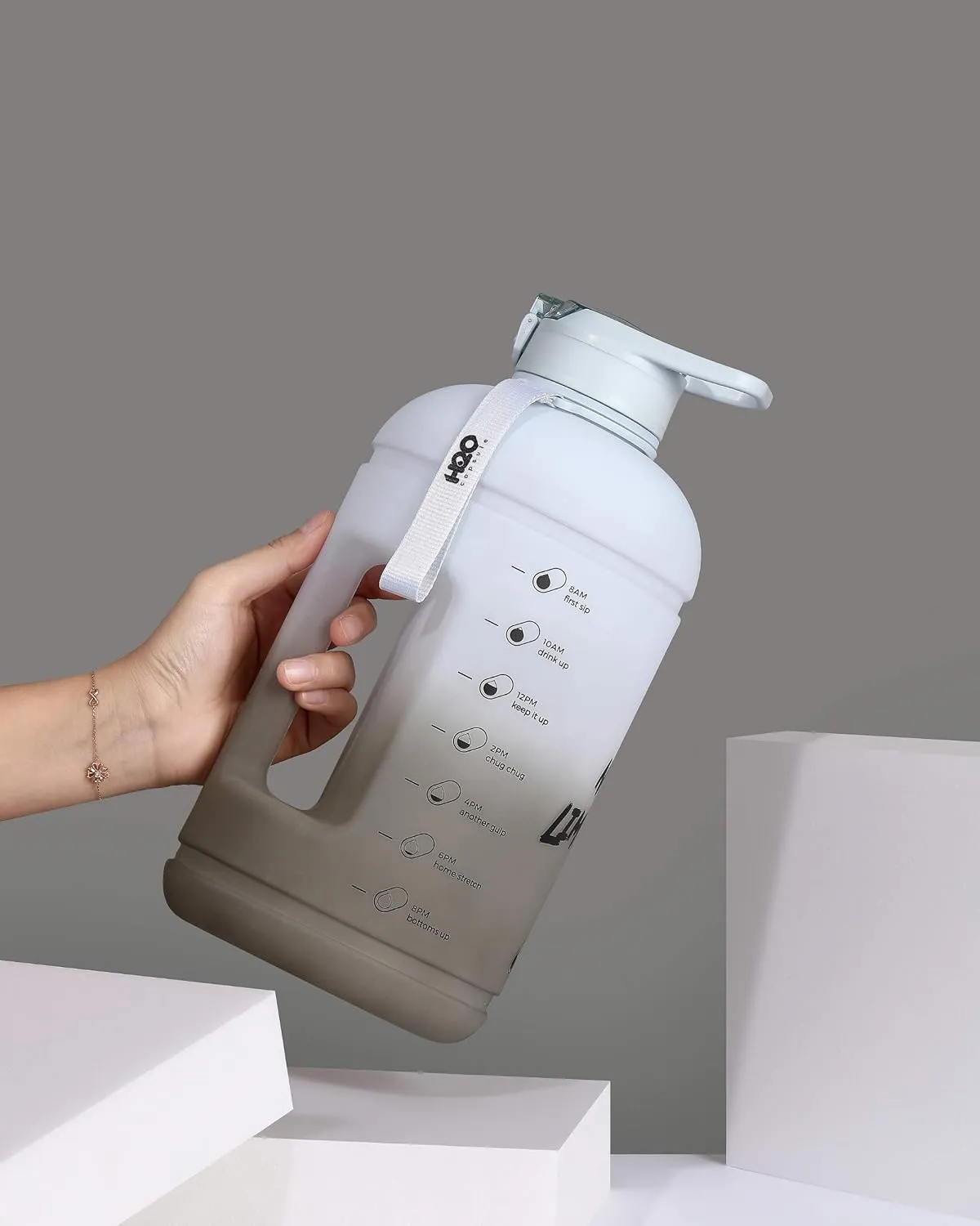 H2O Capsule INSPO Gallon Water Bottle with Time Marker and Straw Motivational Hydration Tracker Jug Big BPA-Free Food-Safe Leakproof Drinking Bottle with Handle & Strap, Rocky Shore