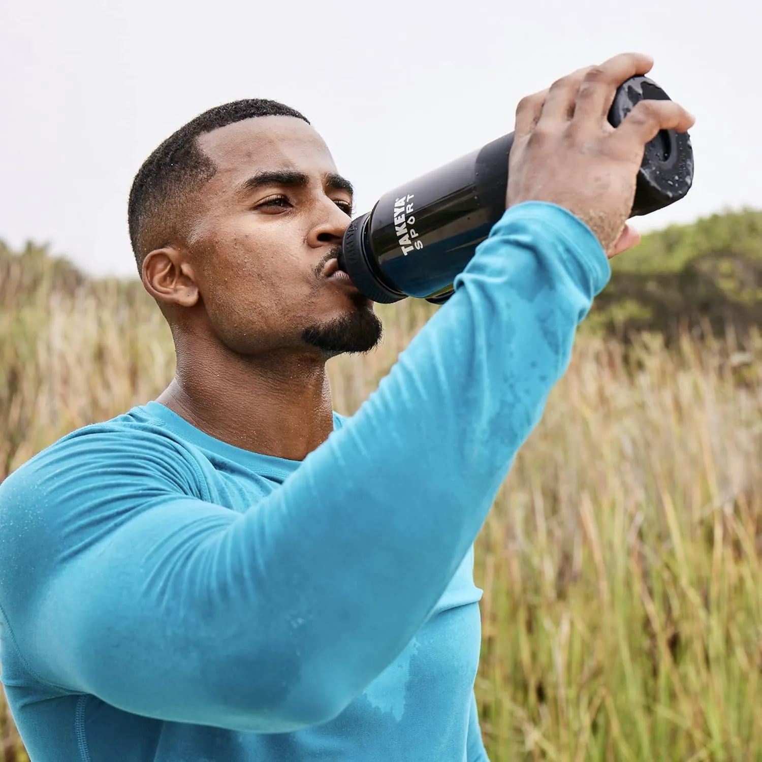 Takeya Tritan Sport Water Bottle with Spout Lid - BPA-Free & Dishwasher-Safe Water Bottle - Reusable Bottle with Lid Handle - Simple Leak-Proof Water Bottle - 40 oz, Grand Slam Black